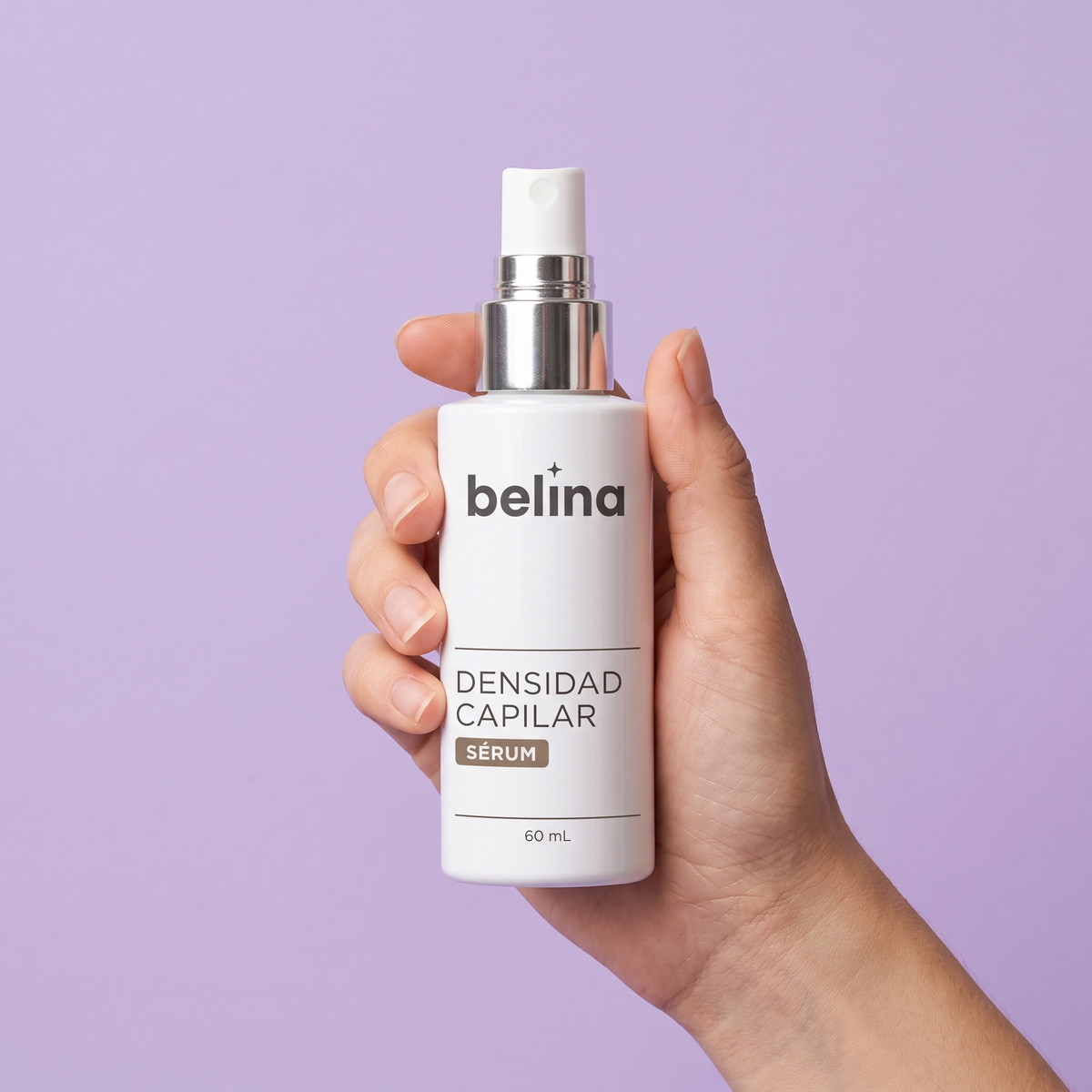 Mano sosteniendo el sérum Belina
